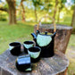 Ensemble de  théière et quatre tasses à thé